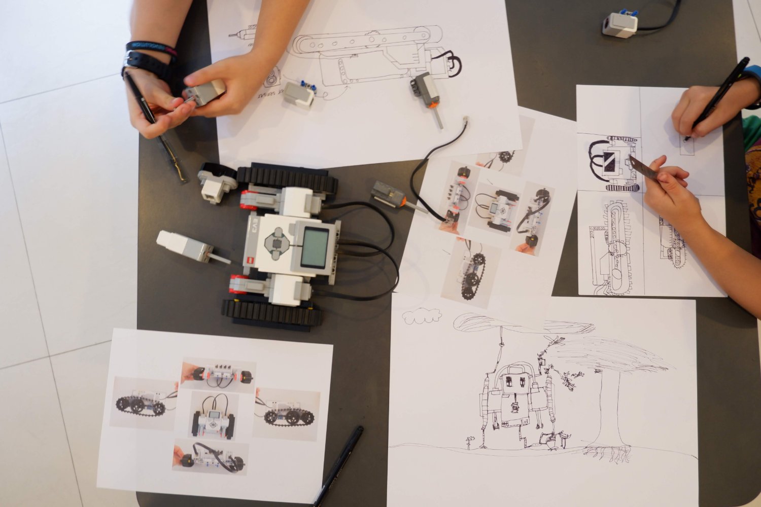 Children building a robot